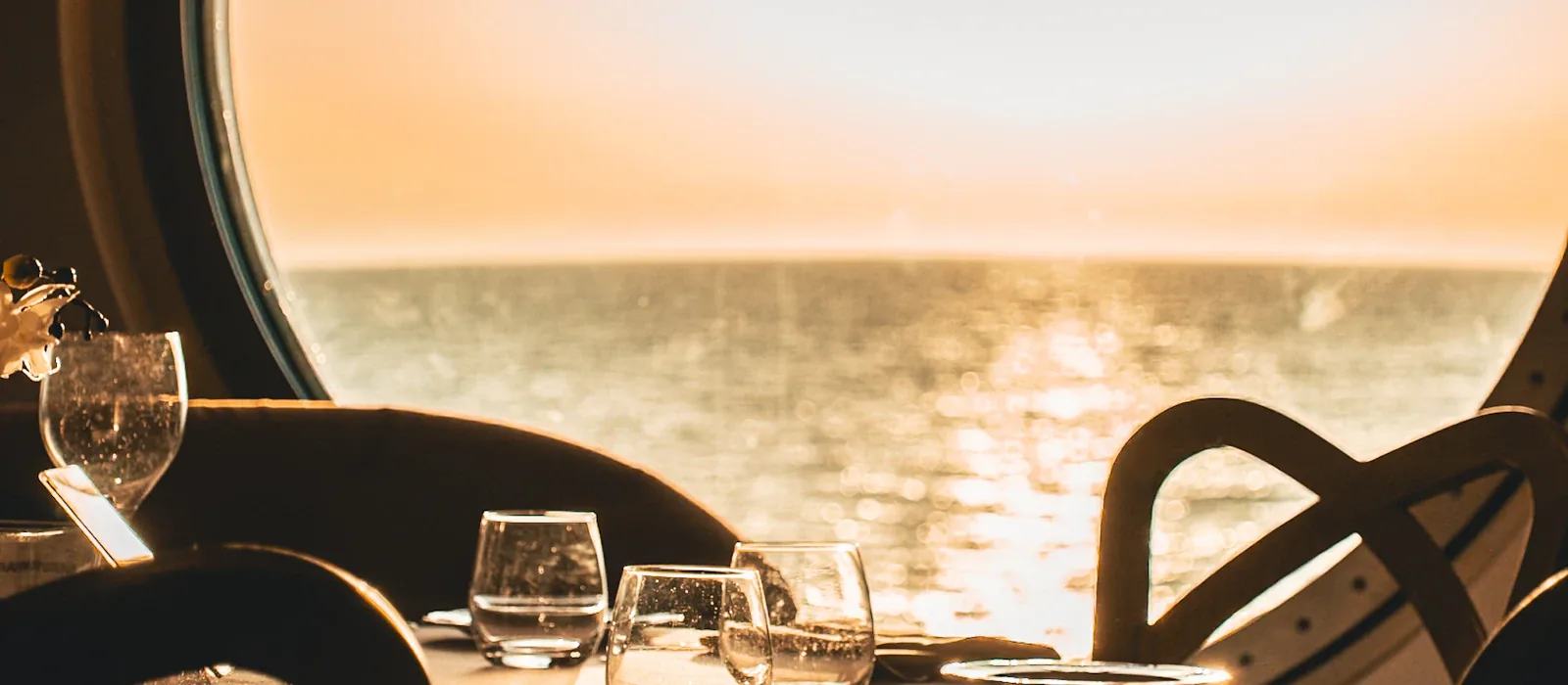 A table overlooking the Mediterranean at sunset
