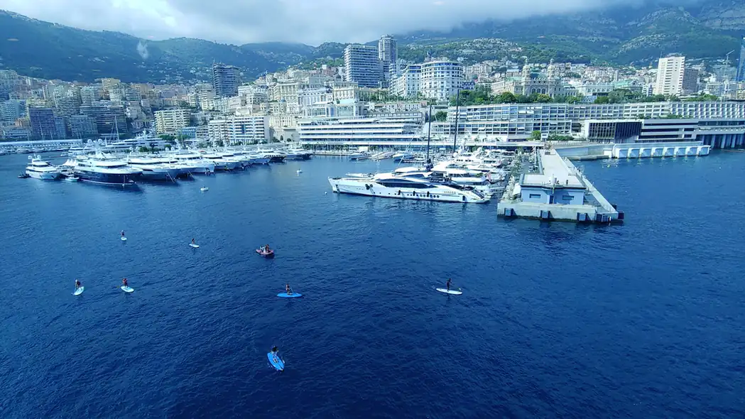 Monaco harbour glowing at dusk